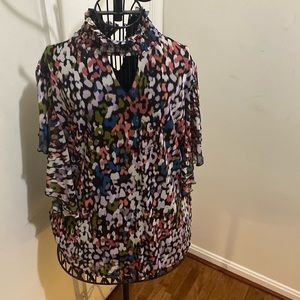 Multi colored layered short sleeve blouse.Pre-owned.